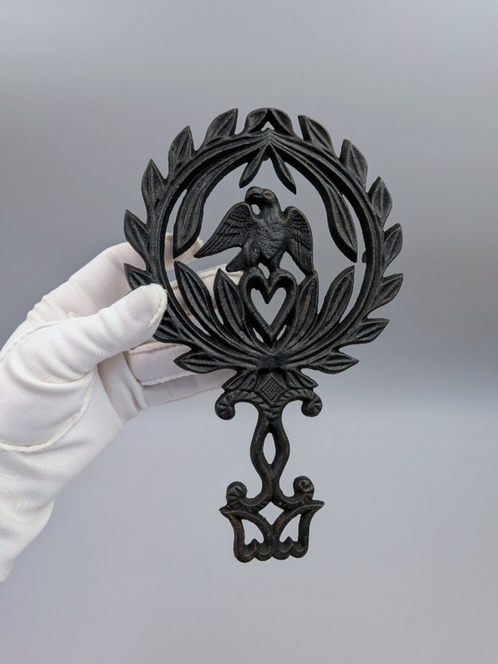 Vintage Black Cast Iron Trivet:, American Eagle over Heart with Laurel Wreath